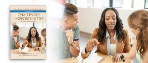 Group discussion beside entrepreneurship book cover